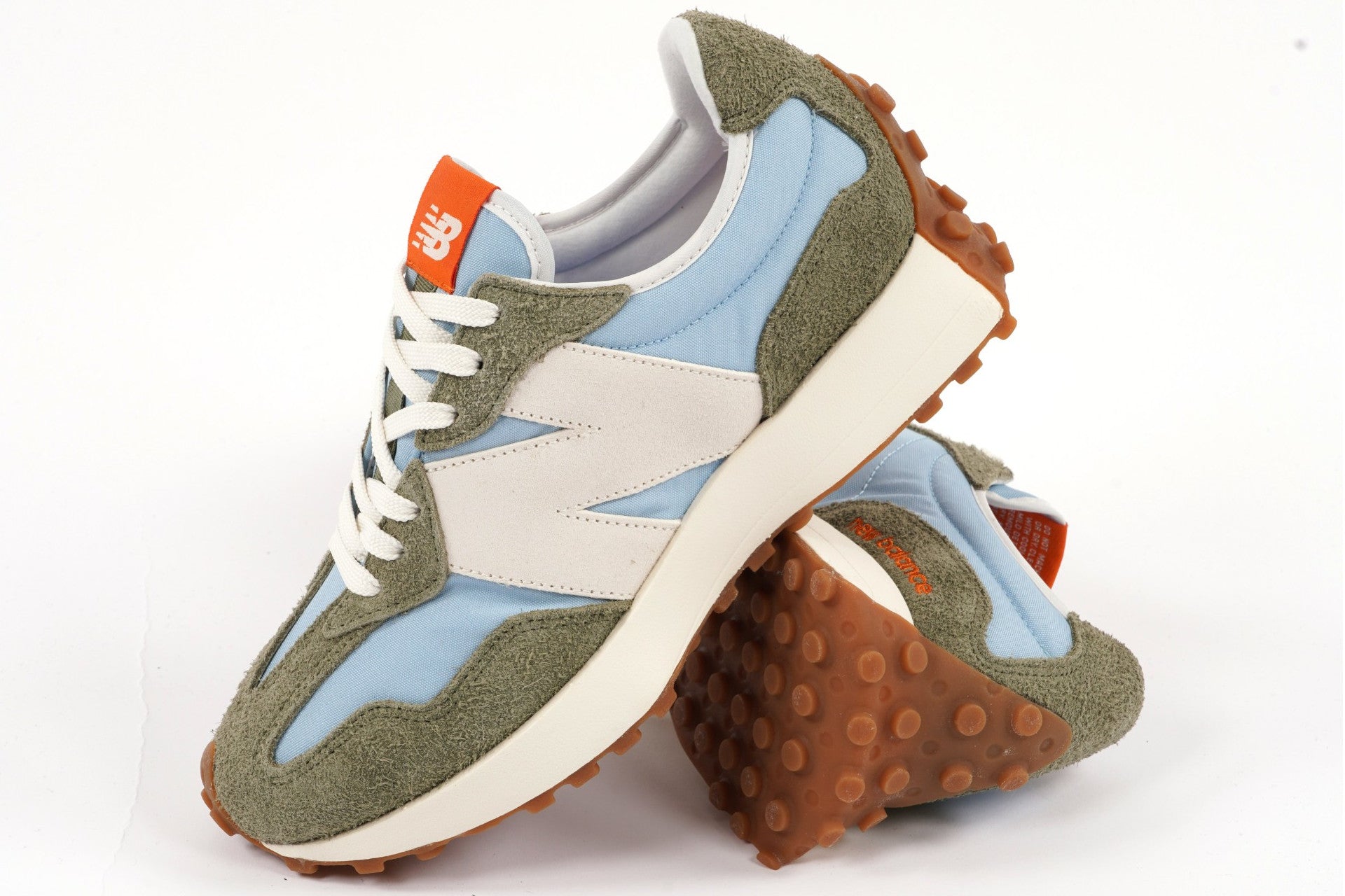 The New Balance 327 Chrome Blue/Dark Olive Trainer Features Furry