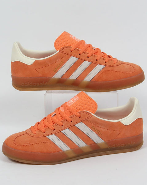 Adidas Gazelle Indoor Trainers in light orange
