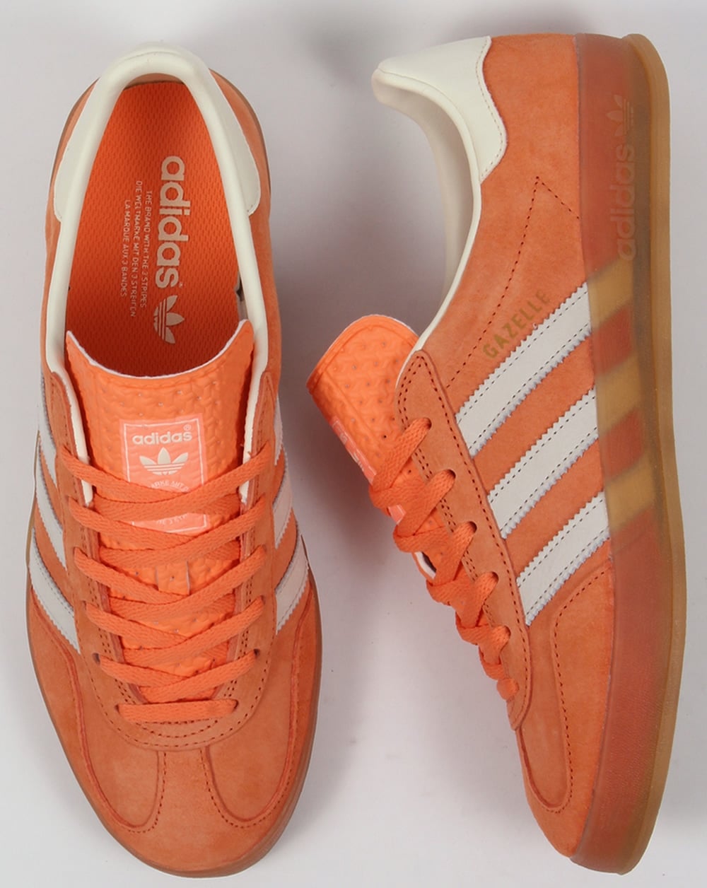 Adidas Gazelle Indoor Trainers in light orange