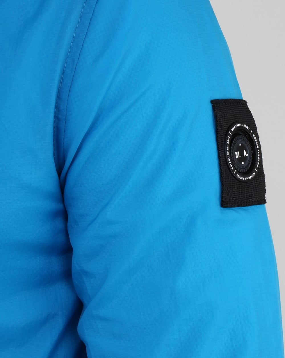 Marshall Artist Light Shell Ripstop Windrunner Cyan