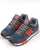 New Balance 574 Trainers Grey/Orange